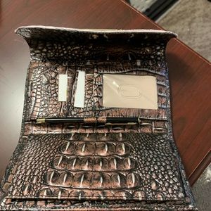 Brahmin check book wallet with original pen.